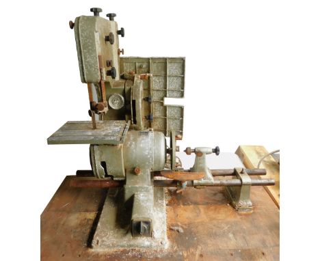 An Emcostar 6 in 1 woodworking machine, including a lathe, a band saw, a sander, etc.Buyer Note: WARNING! This lot contains u