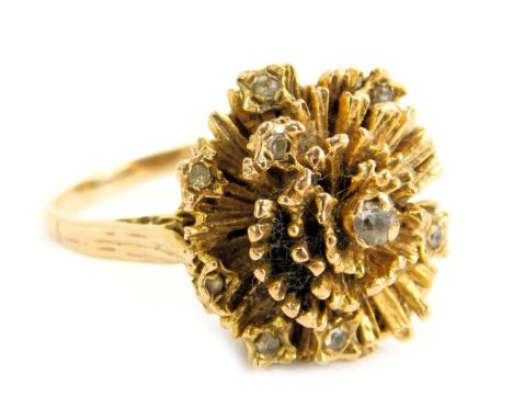 A 9ct gold dress ring, the abstract brushed design ring head set with round brilliant cut stones, maker HM, London 1932, ring