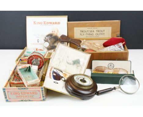 A box of mixed vintage fishing tackle to include lures, flies and feathers. 