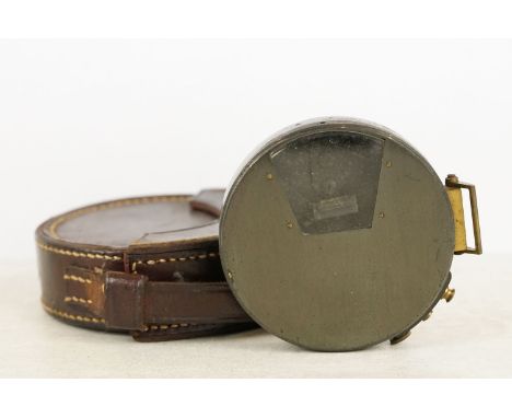 Early 20th century pocket clinometer, leather cased. (Clinometer approx 7cm diameter) 