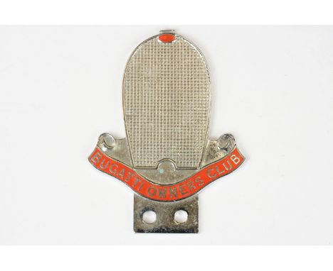 A Bugatti owners club car grill badge. 