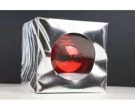 Swatch Light Tree watch complete in original packaging in bauble box.