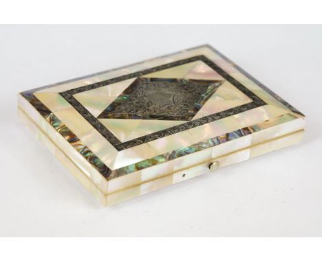 An antique fitted card case with mother of pearl and white metal inlayed decoration, measures approx 11cm x 8cm. 
