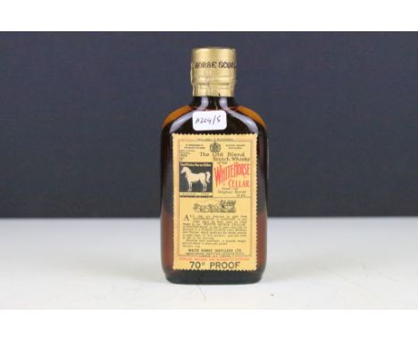 Vintage White Horse Old Blend Scotch Whisky miniature of 70% proof dated 1959. 