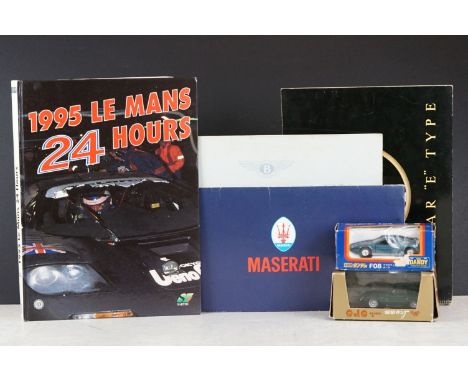 A group of automobile collectables to include ephemera and two diecast models. 