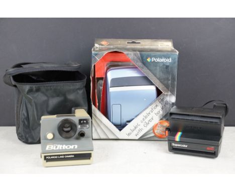 Three polaroid cameras to include The Button Polaroid Land camera, 600 land camera supercolor and Polaroid 600instand gift pa