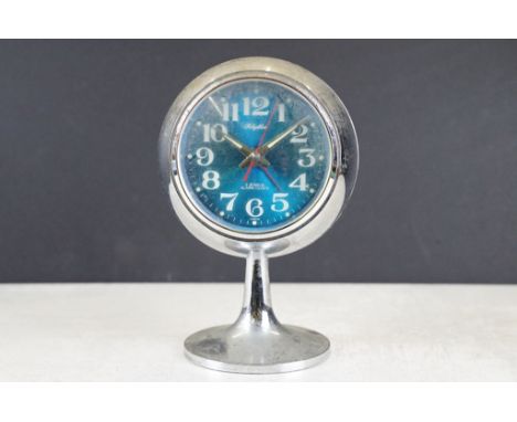 Mid 20th C Retro ' Rhythm ' Japanese alarm clock, the blue dial with Arabic numerals. Measures approx 18cm high 