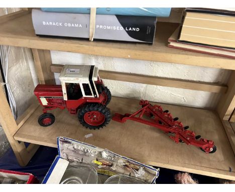 Model International tractor and plough