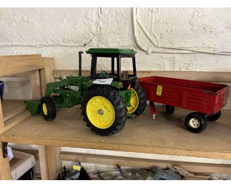 Model John Deere tractor with trailer