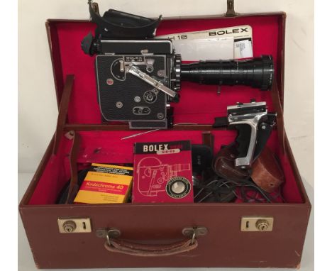 BOLEX H 16 REFLEX ANGENIEUX LENS - A boxed Bolex H 16 SBM camera with carry case manual, one P. Angenieux zoom lens, filters,