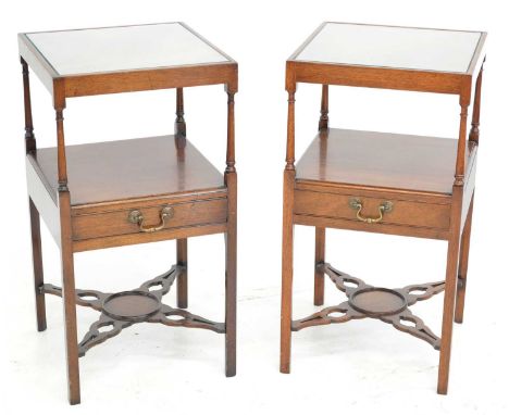 Pair of early 20th-century bedside or lamp tables, each square section with inset glass tops, stage shelf with single drawer,