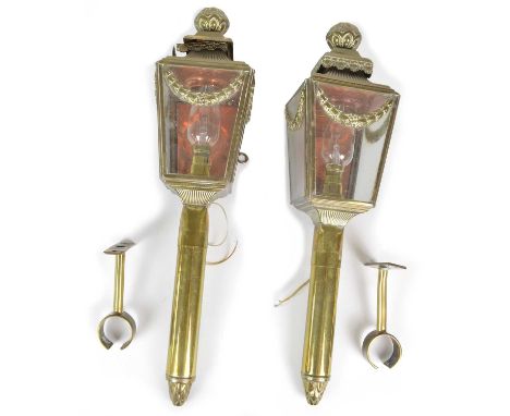 A pair of brass carriage lamps, embossed decoration, clear glass panels with copper reflector, now converted to electricity w