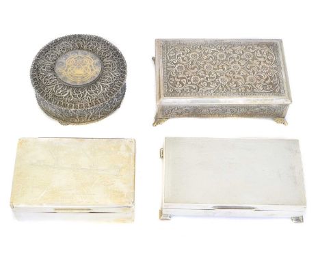 Four silver and white metal boxes, to include two silver cigar cases, a continental filigree trinket box and one other (4).Co