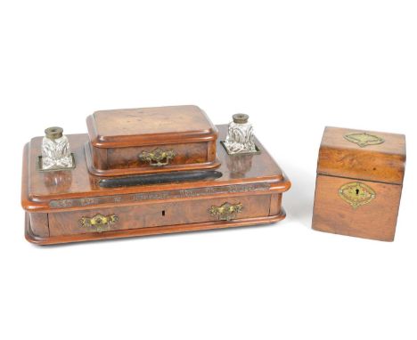 Victorian burr walnut inkstand, rectangular form supporting two ink bottles, central drawer above box base with fitted interi