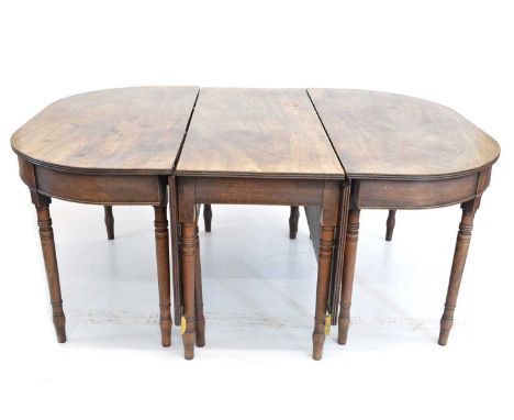 George III mahogany "D" end dining table, the two end sections butting up to a drop-leaf central table with two swinging legs