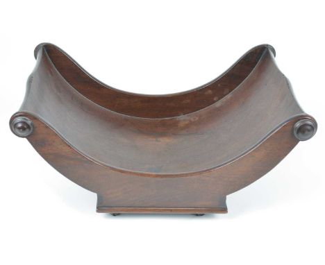 George III mahogany cheese coaster, square base with articulated castors.width 40cm (16"), depth 25cm (10"), height 18cm (7")