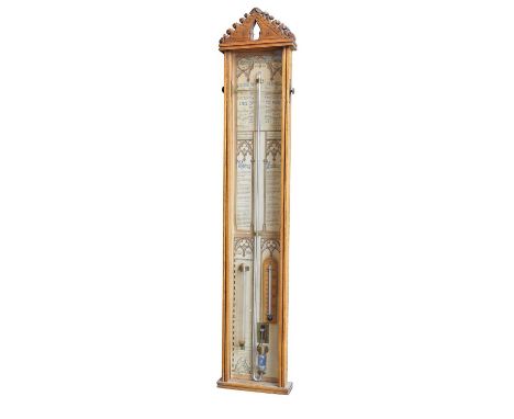 Admiral Fitzeroy stick barometer, Gothic-shaped blonde oak case containing printed papers supporting two verniers, storm glas