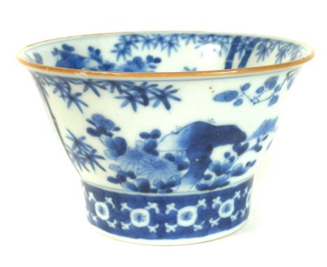 Chinese cup, painted with trees and rockwork in underglaze blue,  Kangxi period 1662 - 1722.10cm diameter Condition report: T