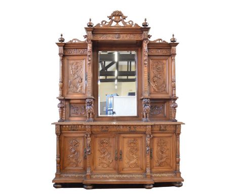 Mid 19th century continental walnut side cabinet, imposing architectural proportions, decorated all over with classical decor