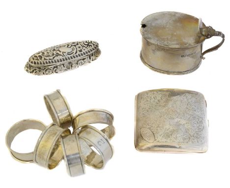 A selection of silver, to include a set of napkin rings, a Henry Matthews trinket box, a cigarette case and a glass lined mus