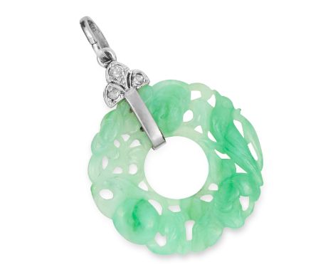 CARVED JADE AND DIAMOND PENDANT set with old cut diamonds and a circular carved piece of jade, 3.6cm, 3.6g.