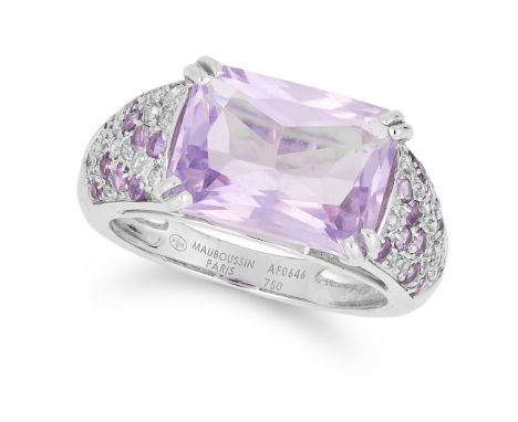 AMETHYST AND DIAMOND RING, MAUBOUSSIN set with an oval cushion cut amethyst in a border of round cut amethyst and diamonds, s