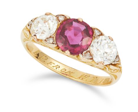 ANTIQUE 1.05 CARAT RUBY AND DIAMOND RING set with a round cut ruby of approximately 1.05 carats between two round cut diamond