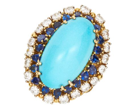 VINTAGE TURQUOISE, DIAMOND AND SAPPHIRE RING CIRCA 1970 set with an oval turquoise cabochon of 25.70 carats, round cut diamon