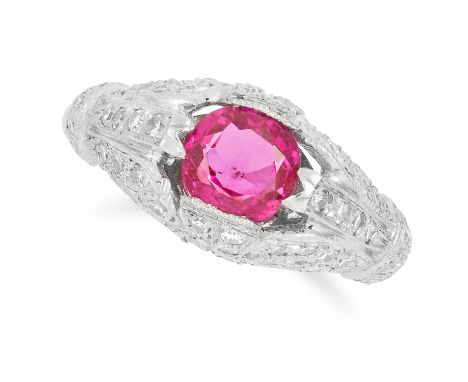 1.50 CARAT BURMA NO HEAT RUBY AND DIAMOND RING set with a round cut ruby of 1.50 carats in a border of round cut diamonds, si