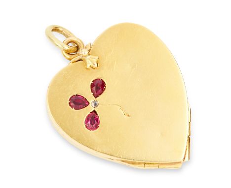 ANTIQUE RUBY CLOVER LOCKET PENDANT in heart form, set with three pear cut rubies, opening to reveal a clover formed of four h