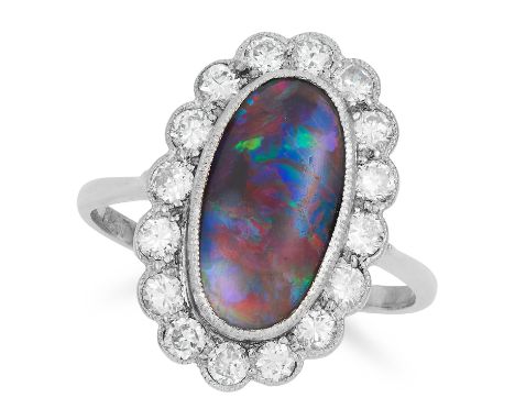 ANTIQUE BLACK OPAL AND DIAMOND CLUSTER RING set with a black opal of approximately 1.87 carats in a border of round cut diamo