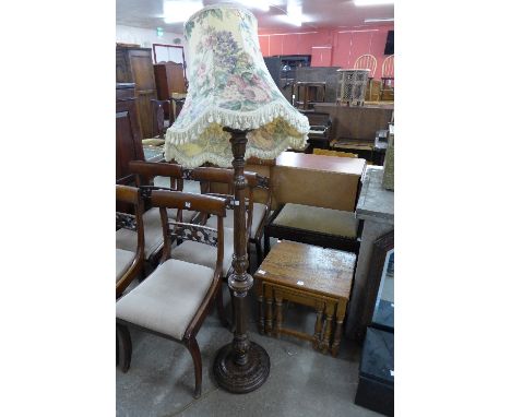 A standard lamp, piano stool and an oak nest of tables