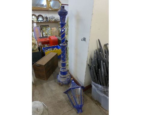 A Victorian painted cast iron street lamp