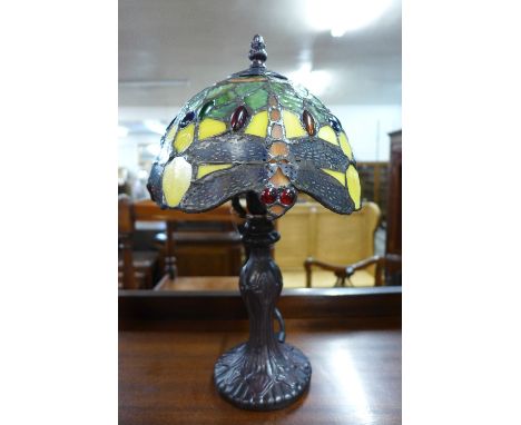 A small Tiffany style lamp