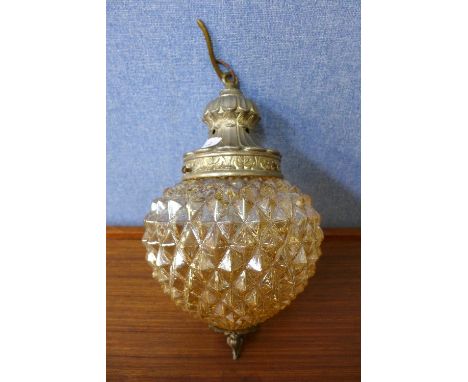 A gilt metal and glass pendant ceiling light