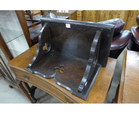 A Victorian Gothic oak wall bracket