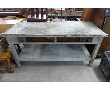 A pine and steel topped work bench