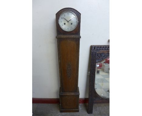 A Haller oak dwarf longcase clock