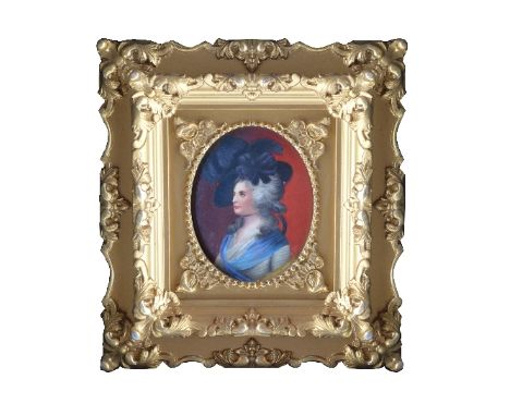 An early 19th Century portrait miniature of a lady, oval quarter length, on porcelain, 8.5 x 7cms, gilt frame