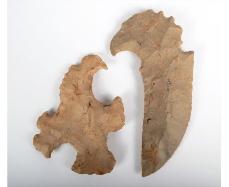 Two Mayan eccentric flints; one with a blade and bird head finial and with inscribed inventory number 264 B.S.I 18cm long the