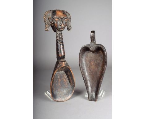 A Luba spoon with a carved head finial 42cm long and an Indonesian food bowl with a handle and spouted end 32.5cm long. (2)