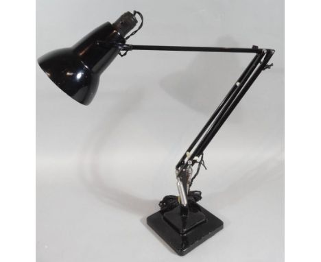 A 1950 angle poise lamp, by Herbert Terry & Sons, in the Bauhaus style, articulated triple sprung stem on stepped square base
