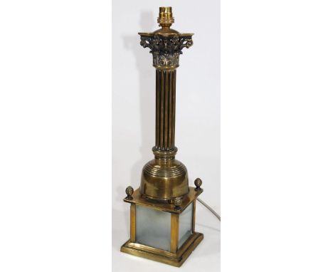 A modern brass table lamp, with Corinthian column stem, square base, frosted glass door and modern fittings, 55cm high.