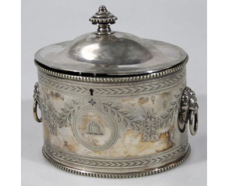 An Edwardian silver plated tea caddy, of oval form with a dome top lid centred with urn knop, the bright cut body with a cent