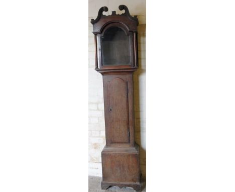 A 19thC oak and mahogany long case clock case only, the swan neck pedimented top with metal roundels above a shaped trunk doo