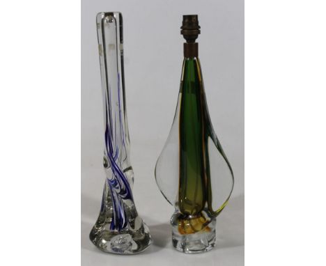 A modern green and gold lobed lamp base, and a modern blue and white swirl lamp base. 