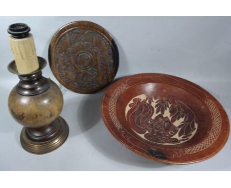 A bulbous wooden table lamp, the globular vase shape stem, with later conversion and 19thC mount on stepped base, 47cm high, 