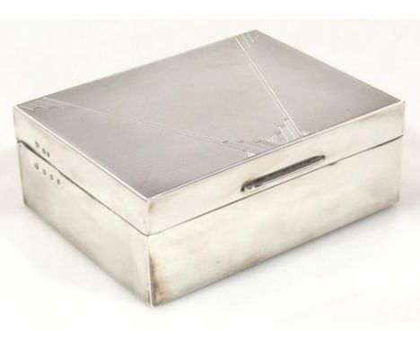 A George V silver Art Deco cigarette box, of rectangular outline, with an outer geometric and engine turned decoration, with 