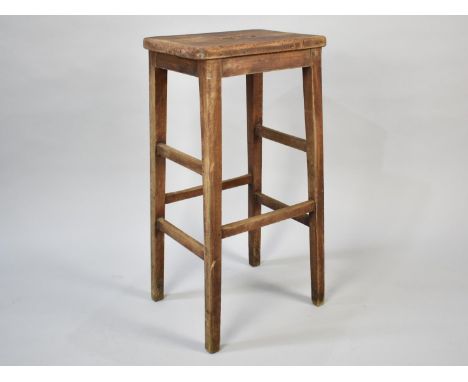 A Vintage Rectangular Topped Work stool, 38cms by 29cms and 76cms High