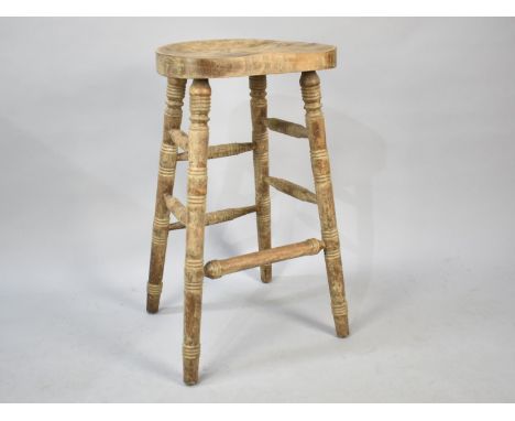 A Vintage High Stool on Turned Supports, 75cms High